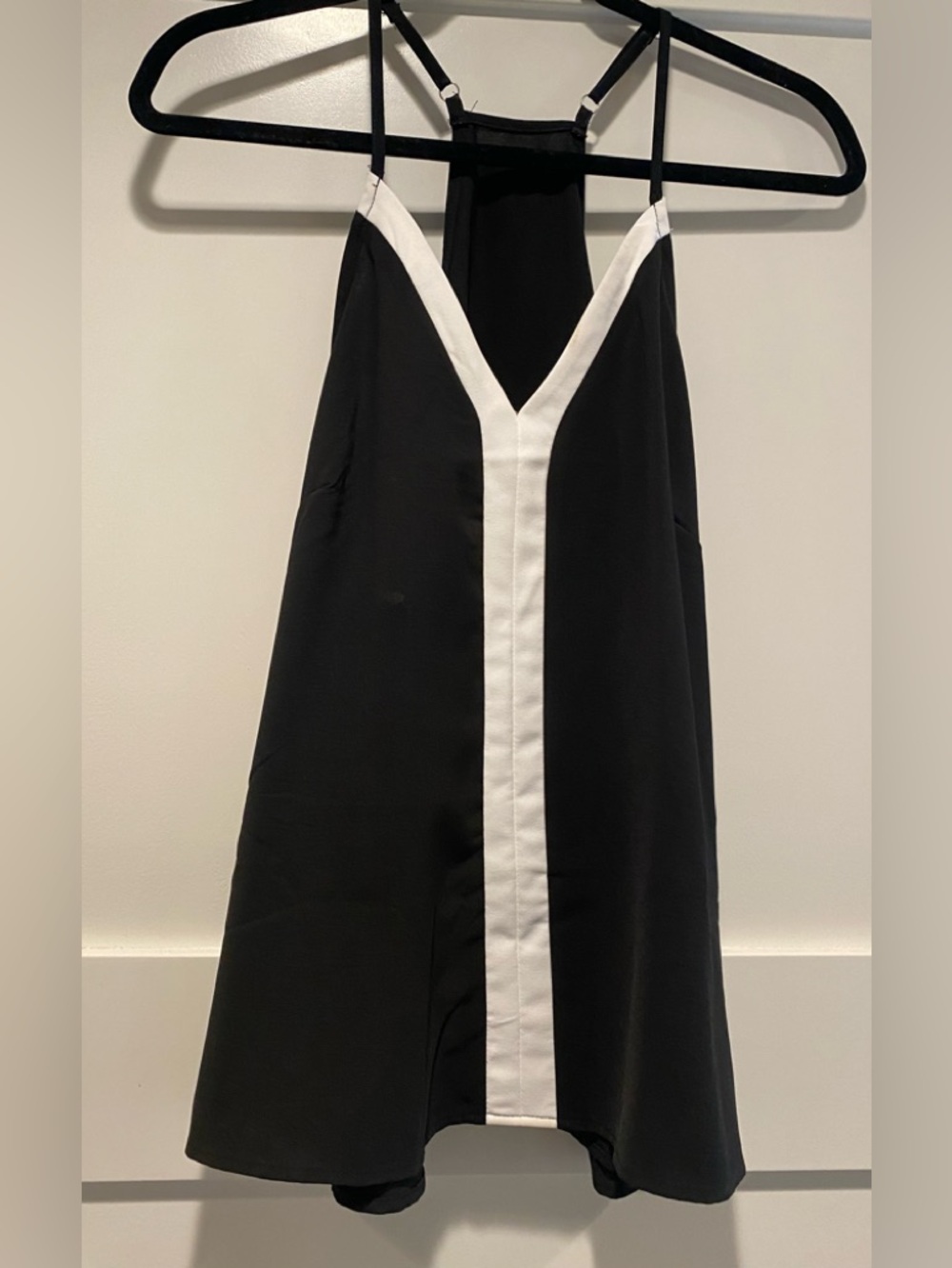 Black and white tank top with adjustable straps size medium